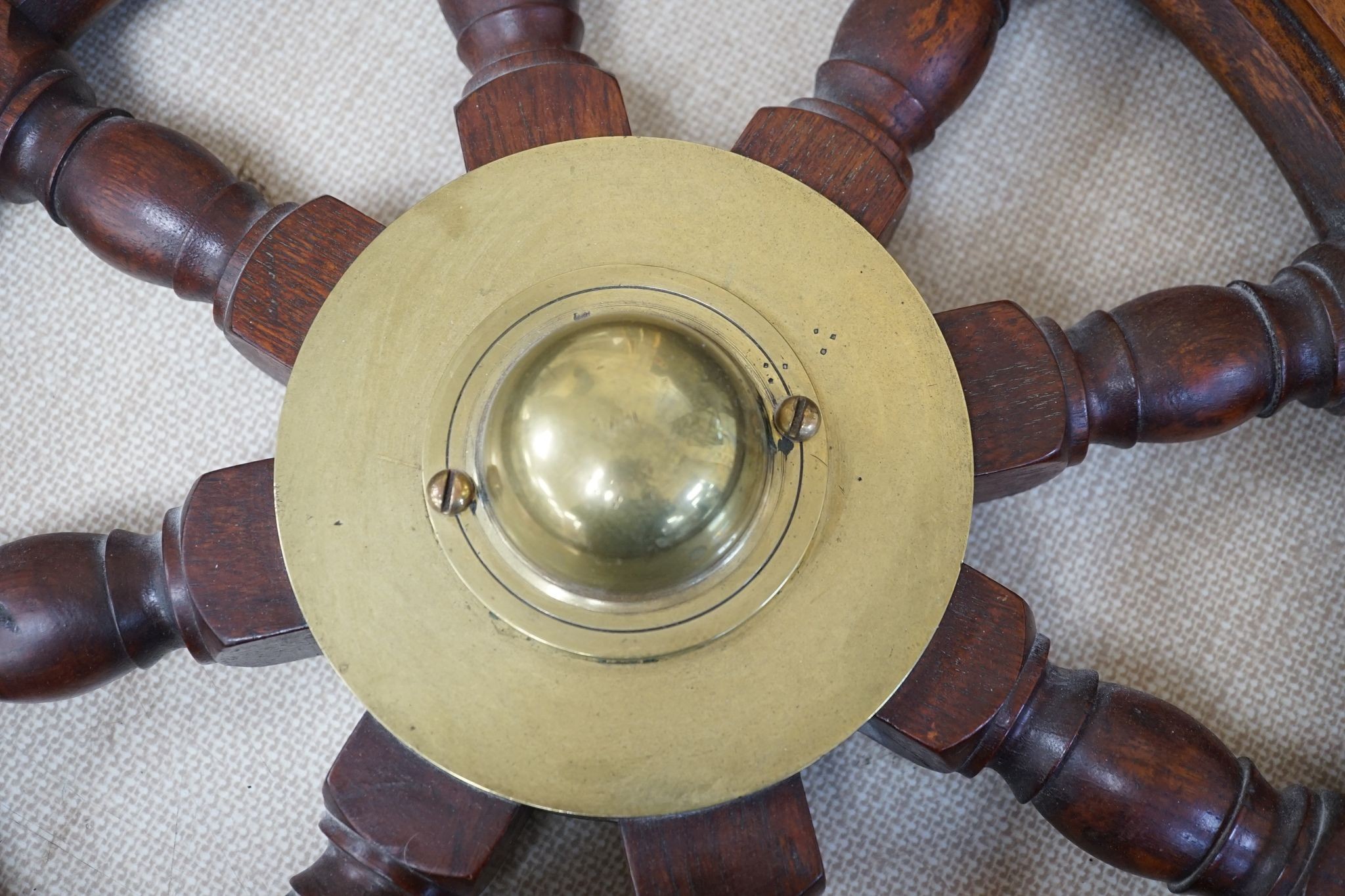 A 19th century mahogany and brass mounted ship's wheel 77cm